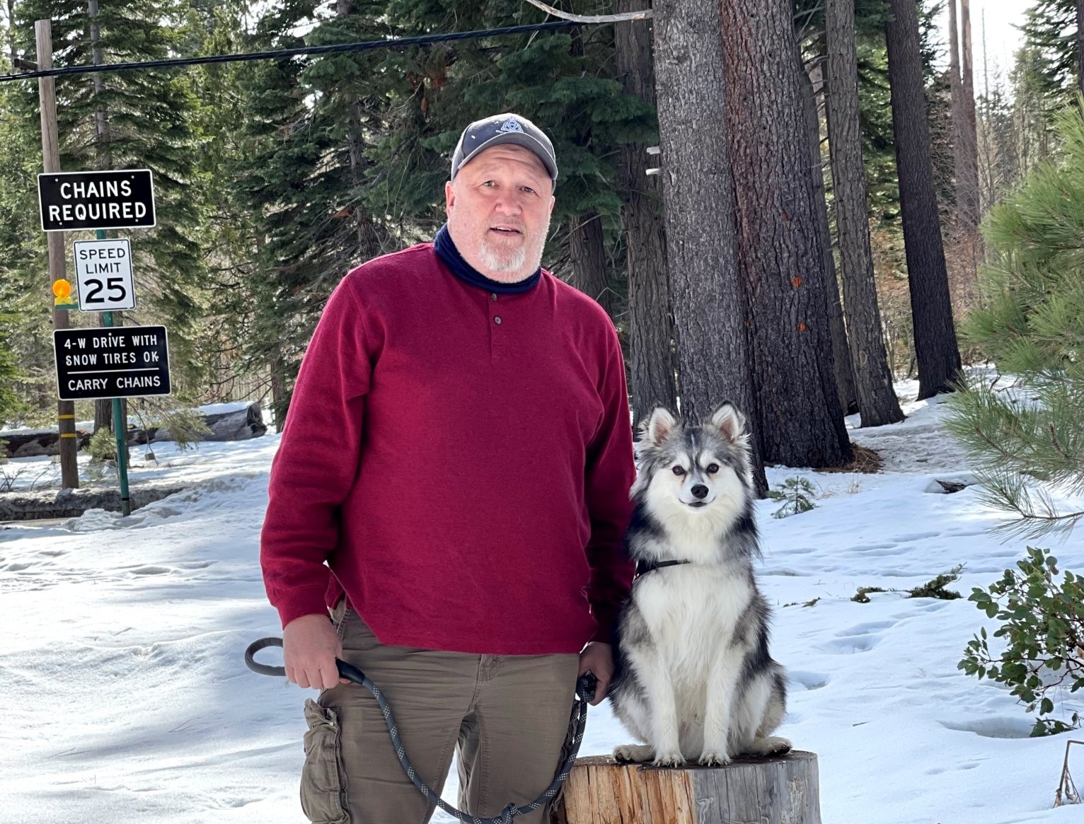 Mike, a travel surgical technologist working with American Traveler in Kansas with his dog