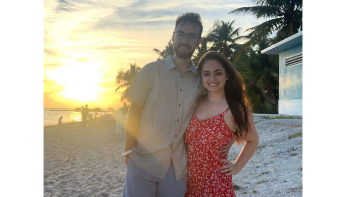 Traveling PICU nurse on beach with partner