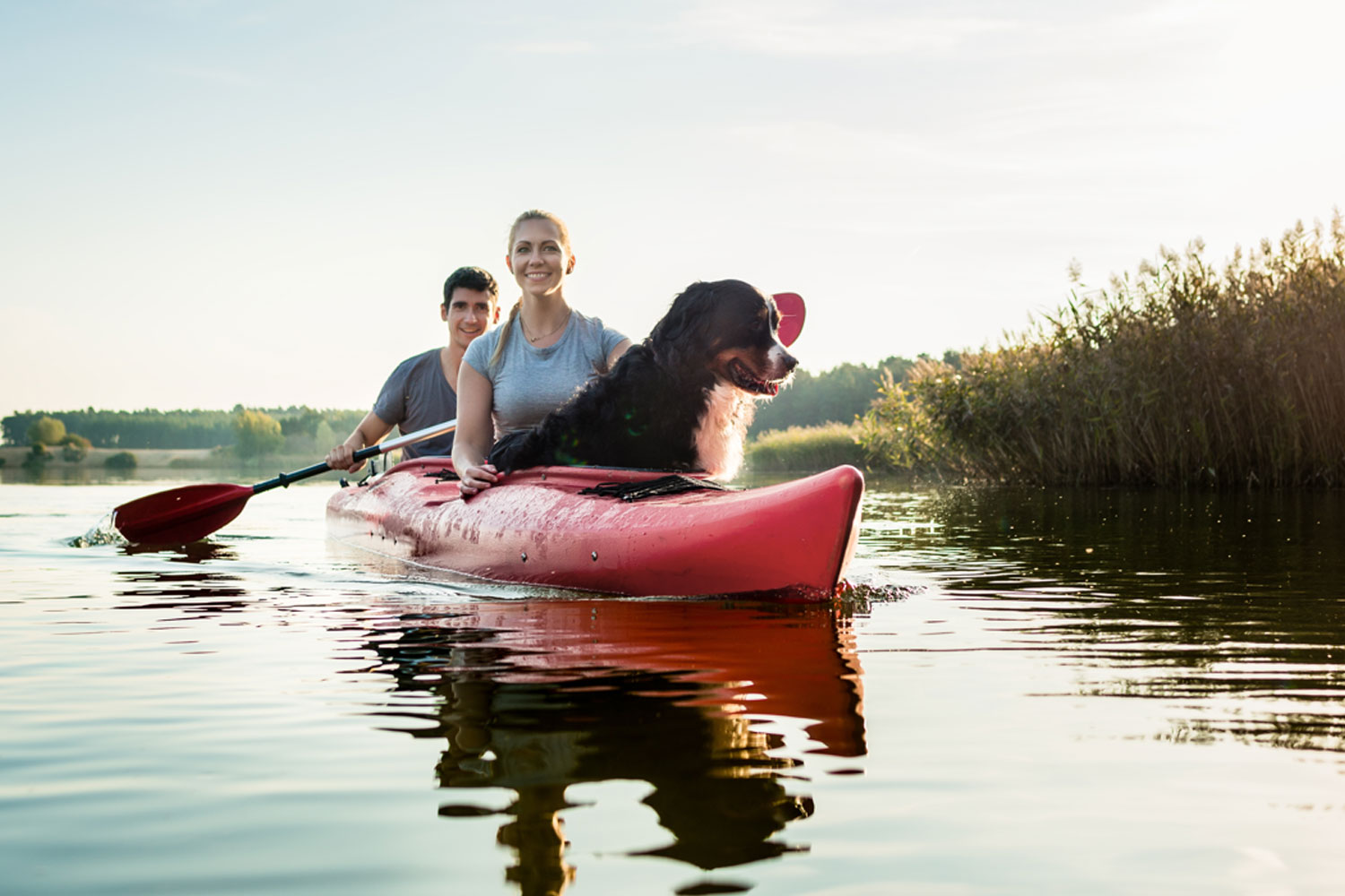 Healthcare professionals new to travelling enjoying kayak trip