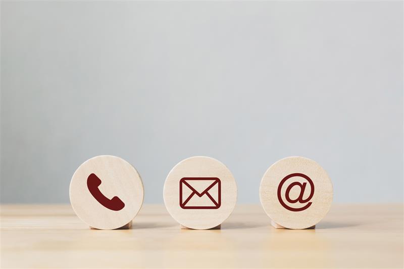 A nurse typing on their laptop